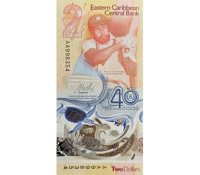  Банкнота 2 доллара 2024 (2023) «40 лет Центральному банку» Восточные Карибы Пресс, фото 1 